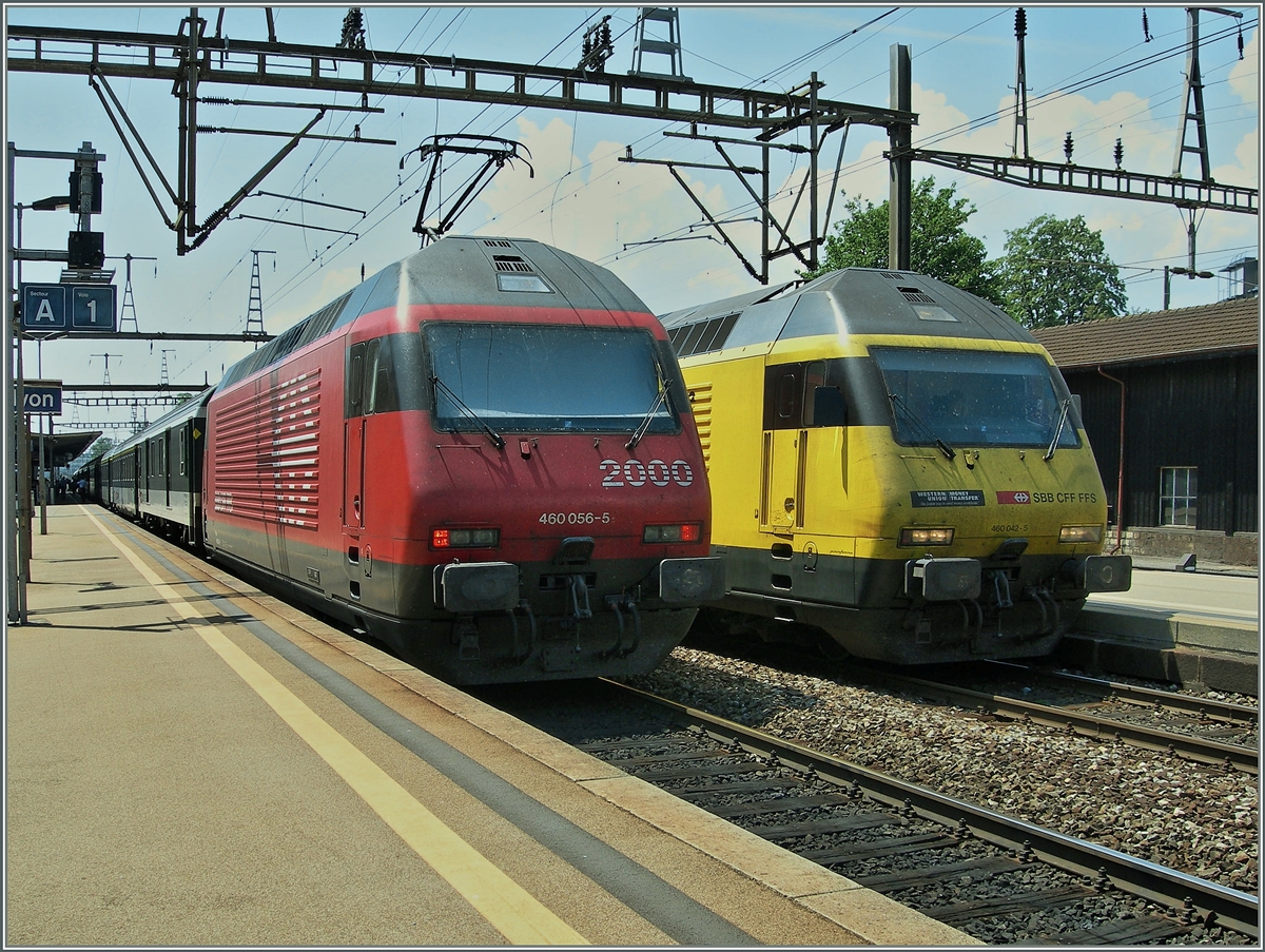 Die SBB Re 460 056-5 und 042-5 mit IR Zügen in Nyon.
25. Juli 2006