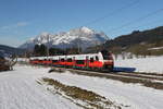 4748 044 aus St. Johann kommend am 3. Dezember 2025 bei Fieberbrunn.
