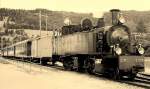Die G 2/3 + 3/3 E 206 von La Traction im Sommer 1997 in Glovelier.