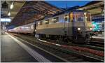 Die IRSI/IGE Re 4/4 II 11387 (Re 421 387-2) wartet mit ihrem ZRT Silvesterzug im Stile der Belle Epoque in Lausanne auf die Abfahrt nach Frankfurt am Main HBF.