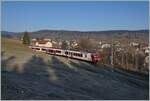 Der TRAVYS RBDe 560 385-7 (RBDe 560 DO TR 94 85 7560 385-7 CH-TVYS)  Lac de Joux  mit B und ABt  ist als Regionalzug auf dem Weg von Le Brassus nach Vallorbe hält dabei kurz in Les