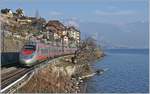 Bei St-Saphorin zeigt sich ein FS Trenitalia ETR 610 als EC 34 auf seiner Fahrt von Milano nach Genève.