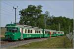 Der Der Be 4/4 12 bef�rdert den BAM Regioanlzug 109 Richtung Morges und erreicht den zu Zeit neugestalltent Bahnhof Chigny.